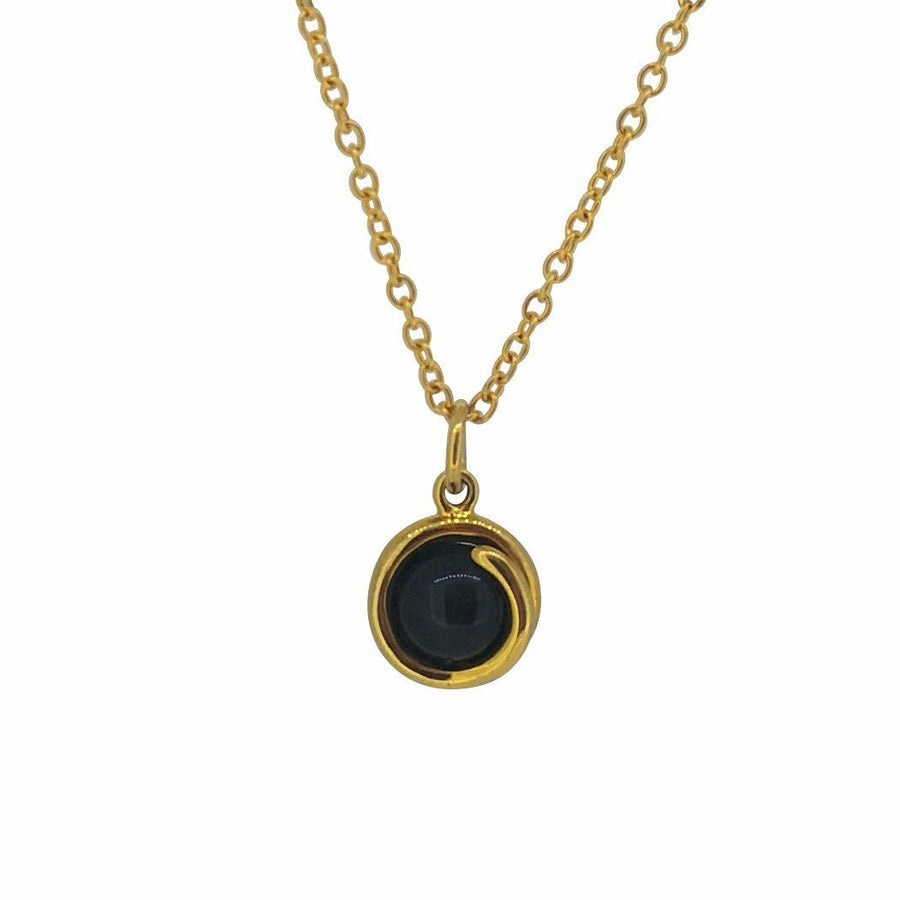 Black Onyx Delicate Gold Pendant Necklace 6mm round Black Onyx set in simple setting wrapped around stone.