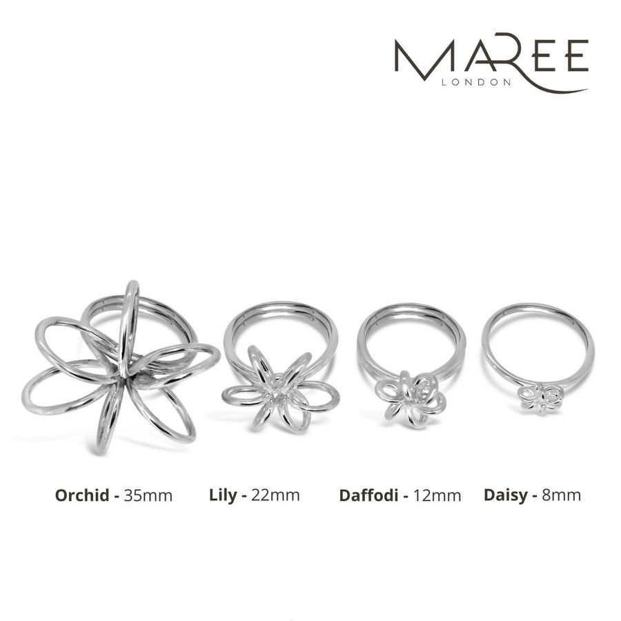 Sterling Silver flower rings in ascending order from statement to delicate Daisy daffodil lily orchid & lotus flower for women Maree London Jewellery British Designer