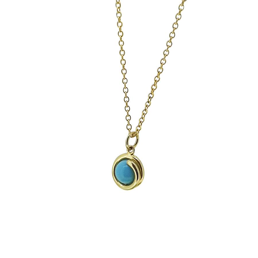 Turquoise Delicate Gold Pendant Necklace 6mm round Turquoiseset in simple setting wrapped around stone side view